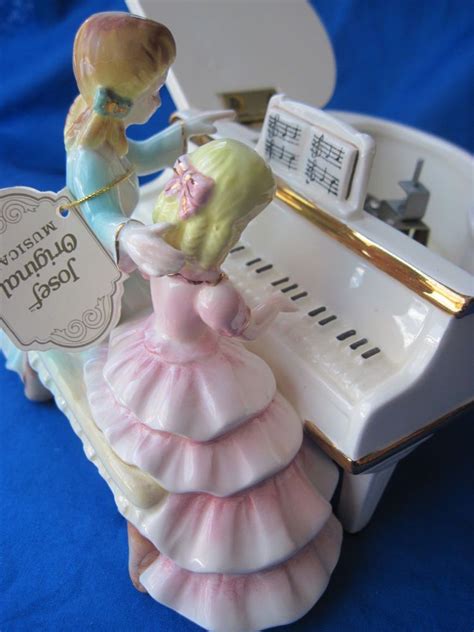 musical porcelain figurines|musical figurines collectibles.